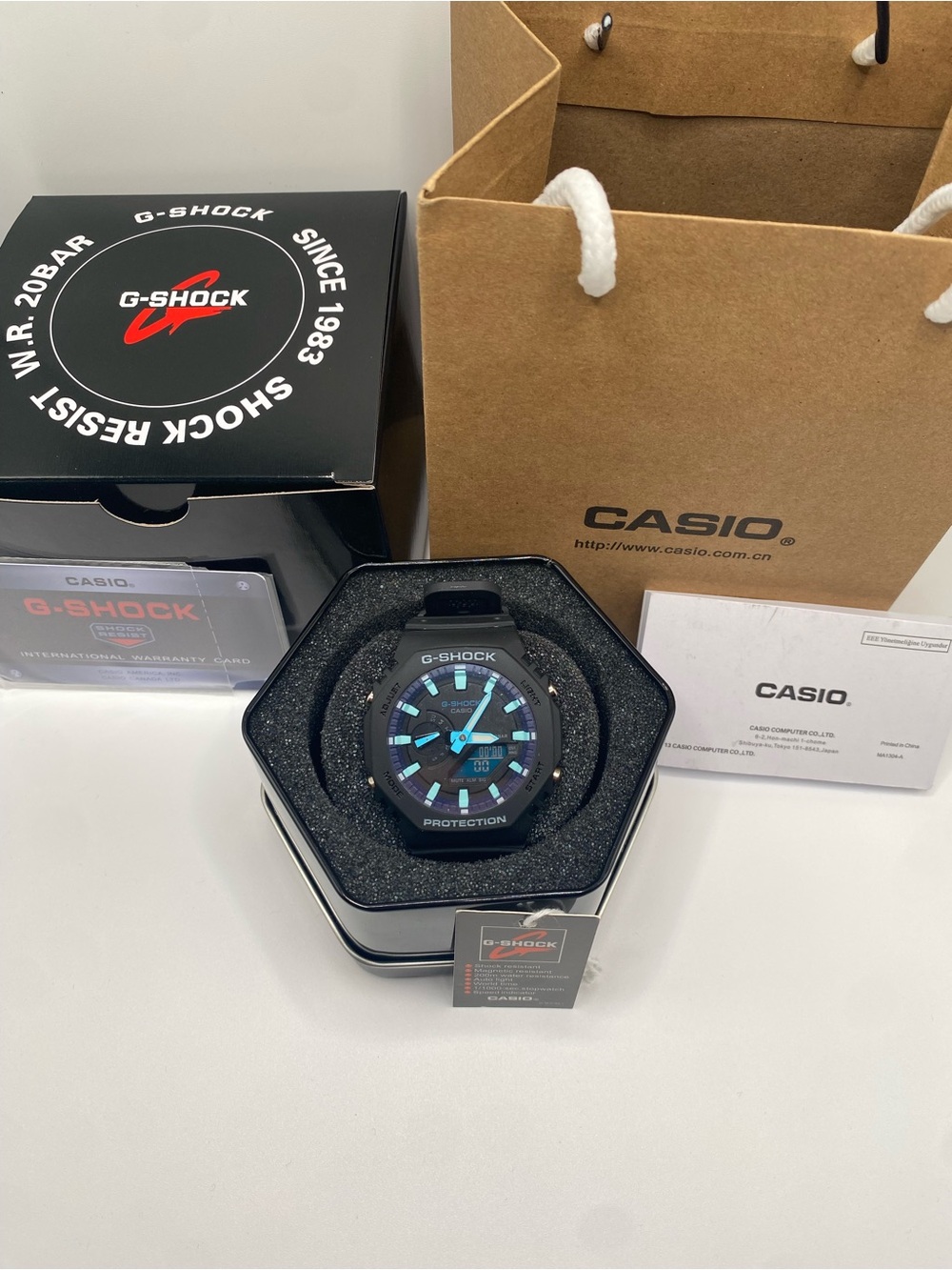 G-Shock Black Watch with Turquoise and Blue Accents